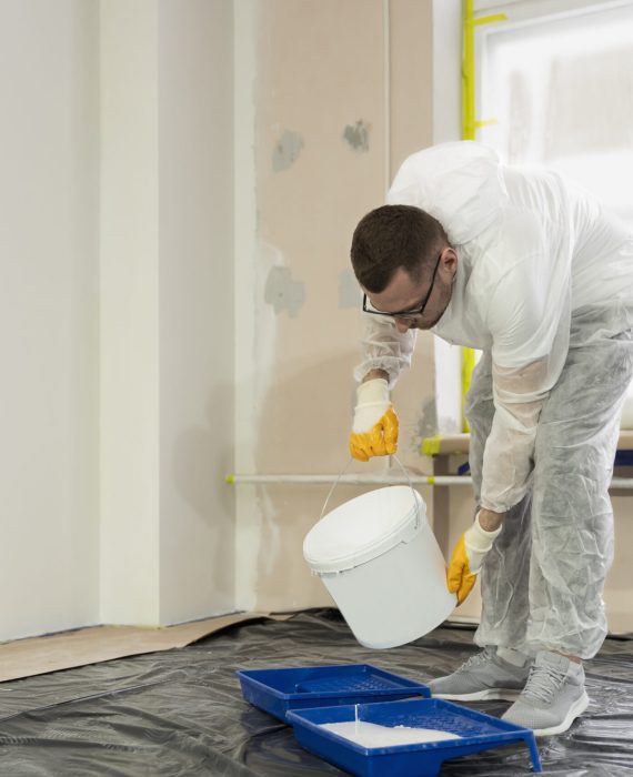 full-shot-man-pouring-paint